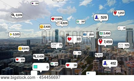 Social Media Icons Fly Over City Downtown Showing People Engagement Connection Through Social Networ