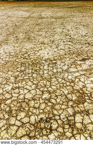 Close-up Of A Cracked Ground Of A Dried Lake On Steppe Near The Sea Of Azov, Ukraine