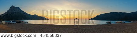 Picturesque Mediterranean Seascape In Turkey. Colorful Spring Sunrise In Adrasan Bay With View Of Mo
