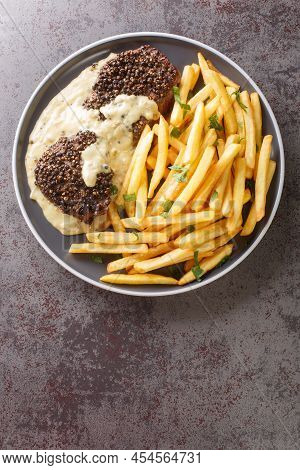 Steak Au Poivre Or Pepper Steak Is A French Dish That Consists Of A Filet Mignon, Coated With Coarse