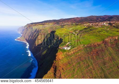 Aerial View Of The Ponta Do Pargo Lighthouse Located On A Massive Cliff In The Madeira Islands, Port