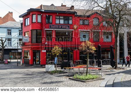 Hasselt, Limburg, Belgium - 04 12 2022 - Red Facade Of The Taste Of India Restaurant In Old Town