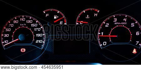 Car Dashboard. Instrument Panel With Speedometer, Tachometer, Fuel Gauge, Oil Temperature, Seat Belt