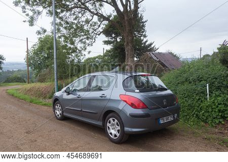 Primelin - France, June 18, 2019 : Peugeot 308 Car Parked On The Shoulder Of A Road
