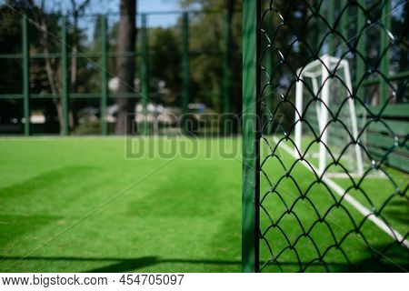 Local Football Field. View On Green Grass Field.