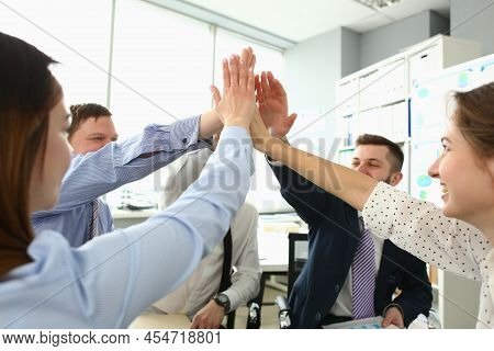 Portrait Of Witty Colleagues Performing High Five Gesture, Successful Profitable Project, Change Fut