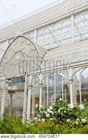 Greenhouse Structure With Flowering Plants In Florence, Italy.