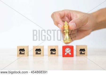 Franchise Or Franchising, Hand Choose King Chess With On Cube Wooden Block Stack With Franchises Bus