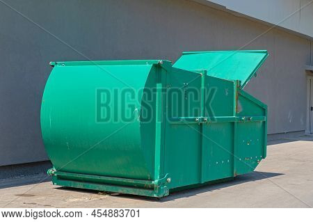 Big Green Press Container For Compacting Industrial Waste