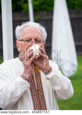 Musician Man Plying Conch, Conchor, Conque, Seashell Horn Or Shell Trumpet From Sea Snail Ethnic Win