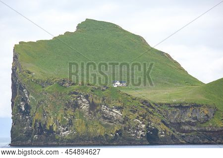 Lonely House On The Island Ellidaey Of The Vestmannaeyjar Archipelago. Iceland
