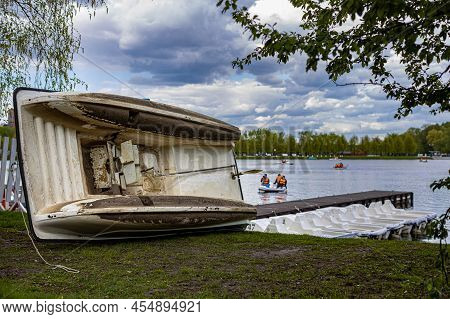 Moscow, Russia - May 14, 2022: Rowing Catamaran Is Under Repair On Land. High Quality Photo