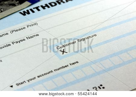 Closeup of bank withdrawal slip