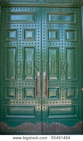 Big Metallic Green Doors of a bank