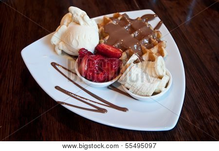 Premium Chocolate Waffle With Strawberry And Banana Topping With Vanilla Icecream