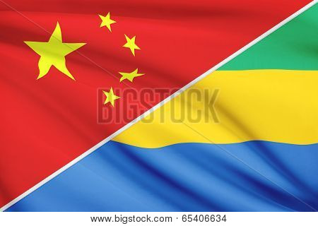 Series Of Ruffled Flags. China And Gabonese Republic.