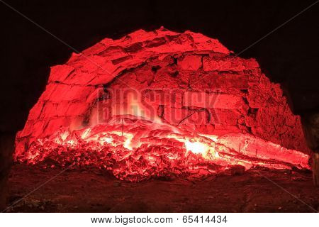 Red live coals in the hearth furnace