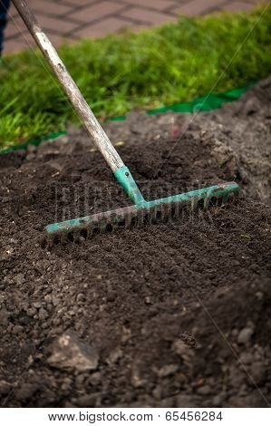 Photo Of Rake On Garden Bed