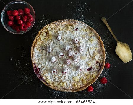Mascarpone Pie With Fresh Raspberries On A Black Background