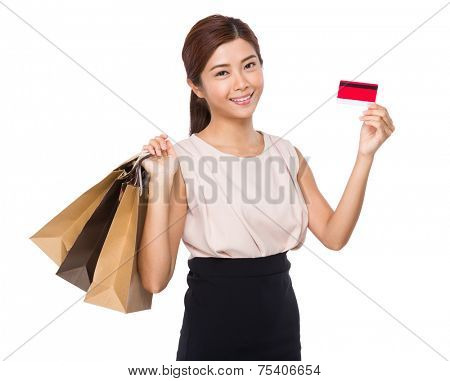 Asian woman with shoppaing bag and credit card