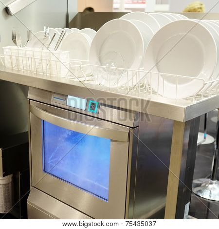 image of a Dishwasher with white plates