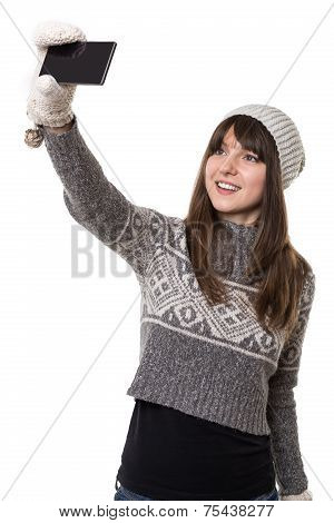 Young attractive woman taking selfie
