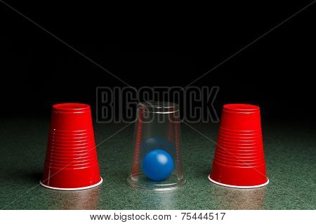 Blue Ball Hidden Under Clear Cup