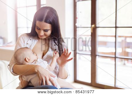 Mother breastfeeding her baby
