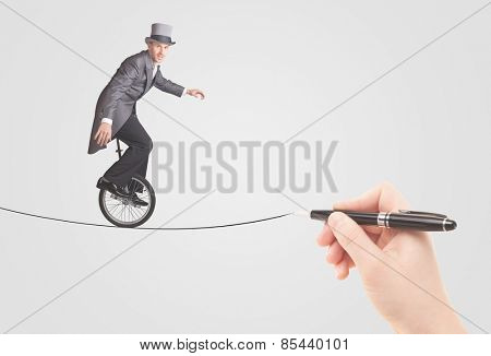 Businessman riding monocycle on a rope drawn by hand concept