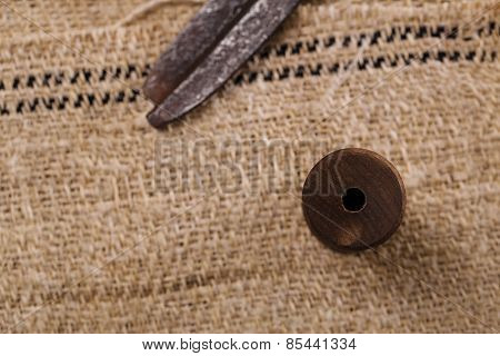real old reel spool with  scissors on old grain sacking linen Completely hand made  handwoven and homespun