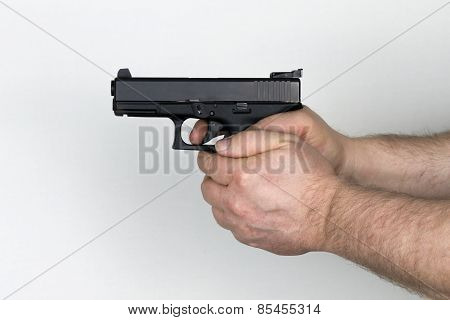 Shooter Holds Black Handgun