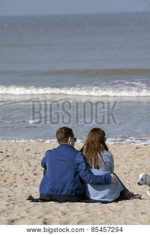 Young Couple In Love At The Beach, Enjoying The Sun