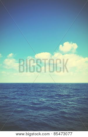 Sea and clouds with copyspace. Instagram style filtred image