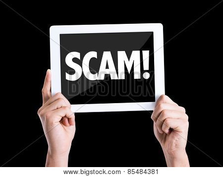 Tablet pc with text Scam! isolated on black background