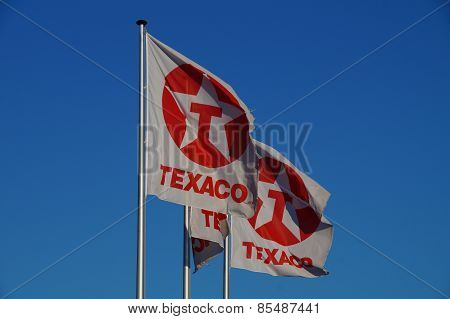 Texaco flags  blowing in the wind