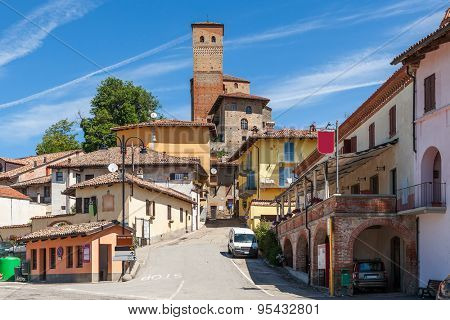 Small town of Serralunga d'Alba under blue sky in Piedmont, Northern Italy.