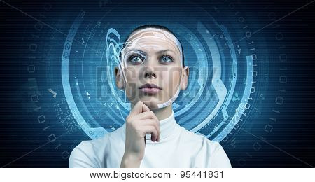 Young thoughtful woman and virtual blue interfase