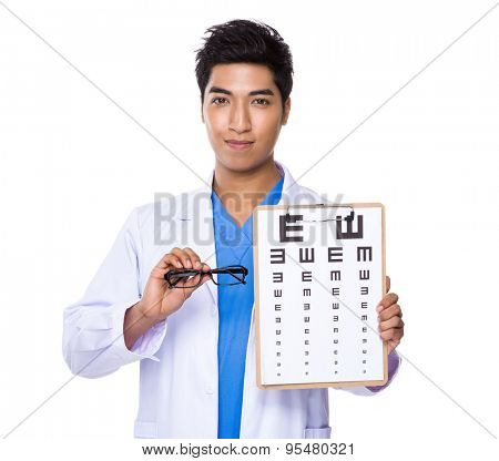 Optician doctor holding with eyechart and glassesa