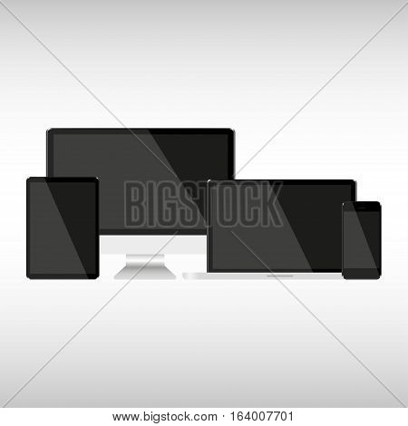 Set with dark screens Computer Notebook Tablet and phone on a gray background