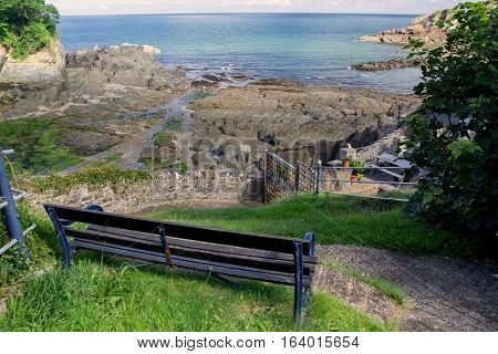 Bench on the grass. Excellent View of the Bay of Combe Martin. North Devon. UK