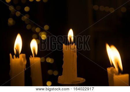 The light from the candle in the night