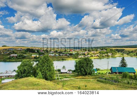 Summer rural landscape. Russia. Ural village Chusovoe founded in 1727 by Akinfy Demidov