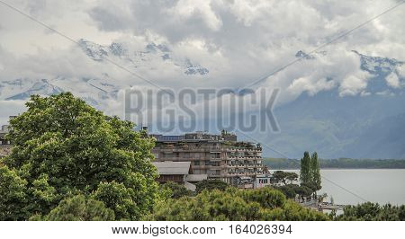 Big house near the lake and mountains