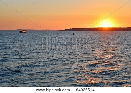 The View Of The Sunset Over The Crimea With A Ferry