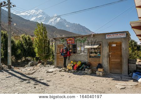 Jomsom, Nepal - October 19: People buying ticket and waiting for bus to arrive, on October 19 2015 in Jomsom Nepal.