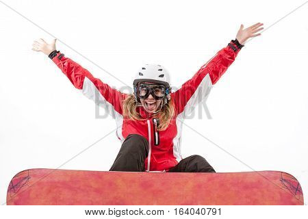 Female snowboarder jumping isolated on white background