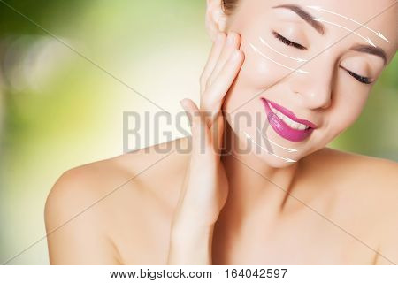 beautiful woman face portrait with surgery marks