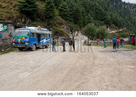 Jomsom, Nepal - October 19: People having a rest from bus ride, on October 19 2015 in Jomsom Nepal.