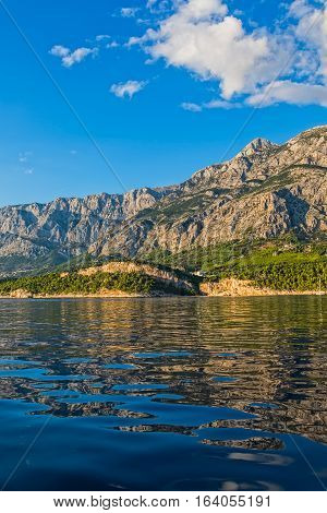 Tucepi view from the boat towards the Biokovo mountain, Adriatic Sea Croatia.