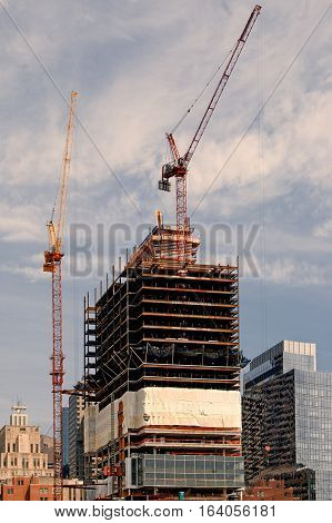 Boston, MA, USA 25 Jul. 2009: Shot of developing building carcas and cranes in waterfront area of Boston.